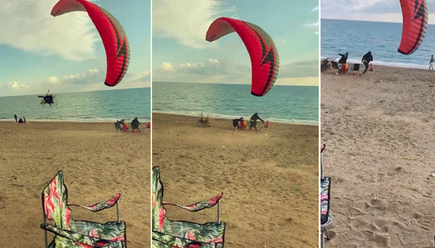 Paramotor yere çakıldı, sahilde oturan aile son anda kurtuldu