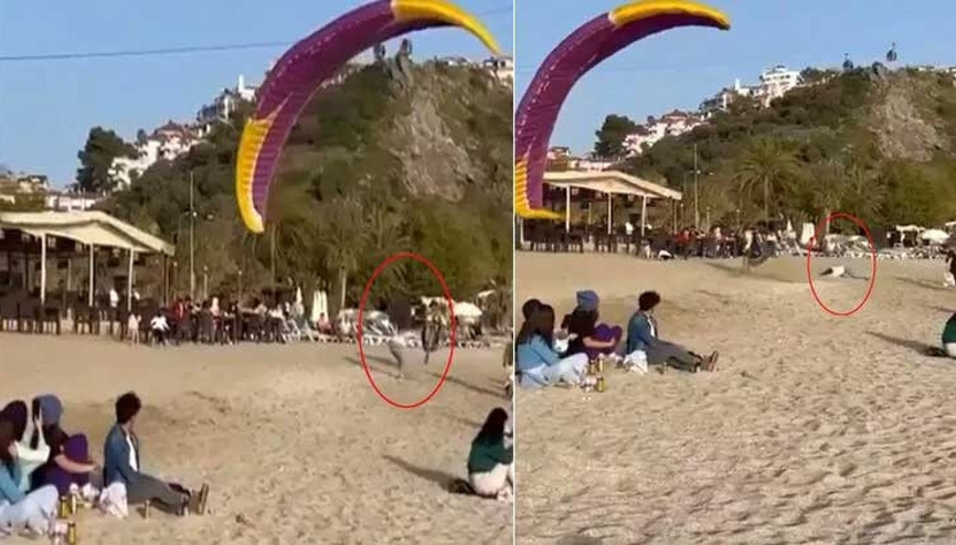 Yamaç paraşütüyle sahilde kadına çarptı Korku dolu anlar kamerada