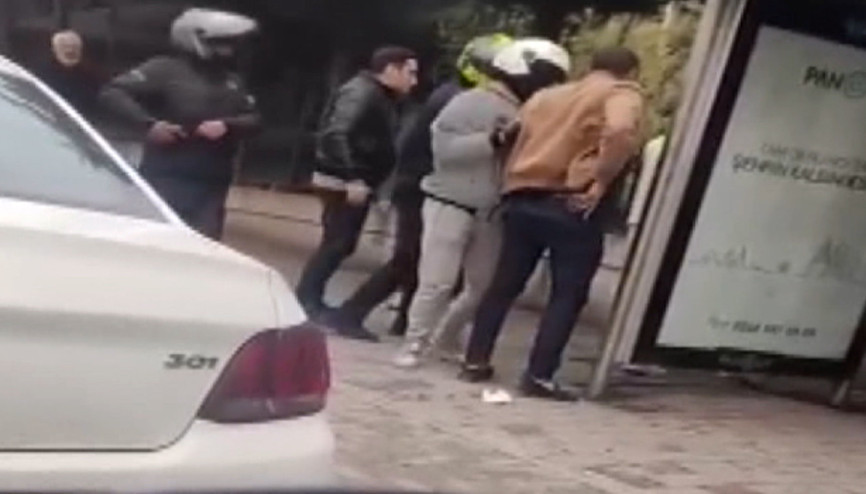 Tartıştığı motosiklet sürücüsünü belindeki silahla tehdit etti