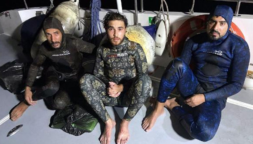 Dalgıç kıyafetli kaçak göçmenler, Yunan adalarına yüzerek geçmek istemiş