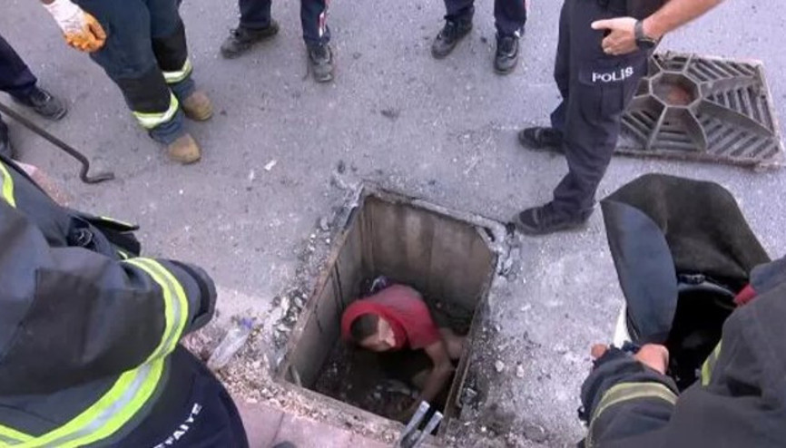 Kanalda mahsur kalan şüpheliye balyozlu kurtarma