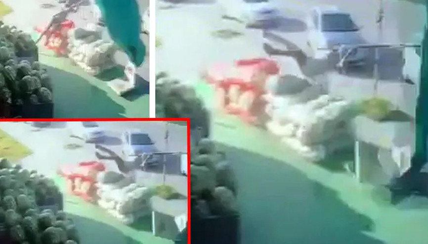 Şiddetli rüzgarda havalanan şemsiyeyle uçtu O anlar kamerada