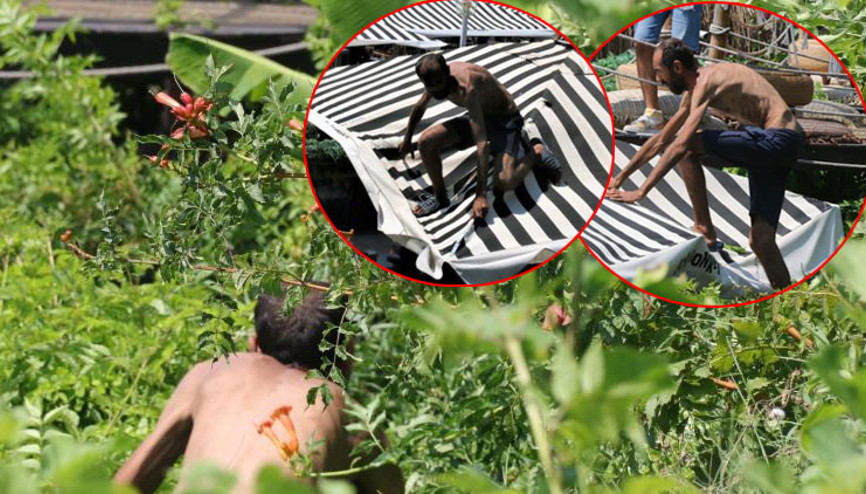 Tarzan adam alarmı: Demirlere tırmandı, polise zor anlar yaşattı... Çevredekiler meraklı gözlerle izledi