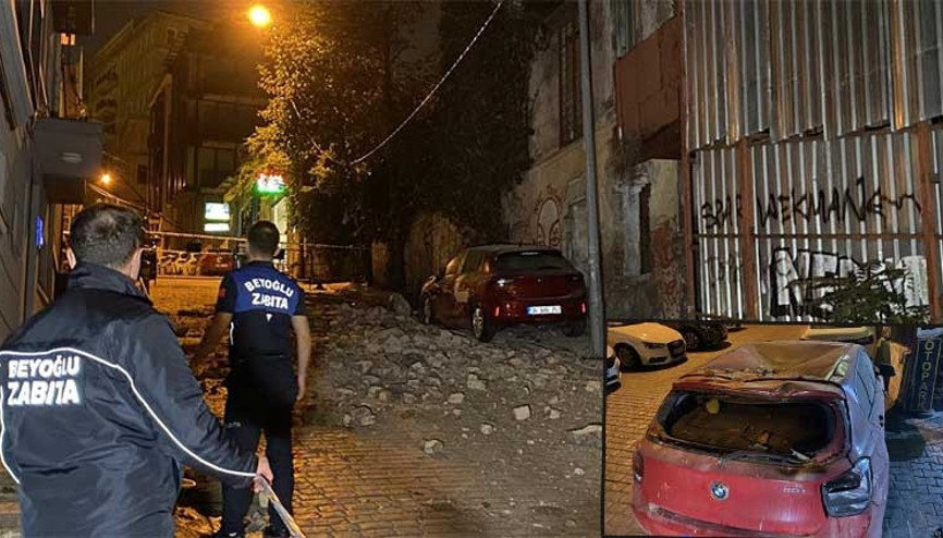 Beyoğlunda metruk binadan dökülen taşlar park halindeki 3 aracı pert etti