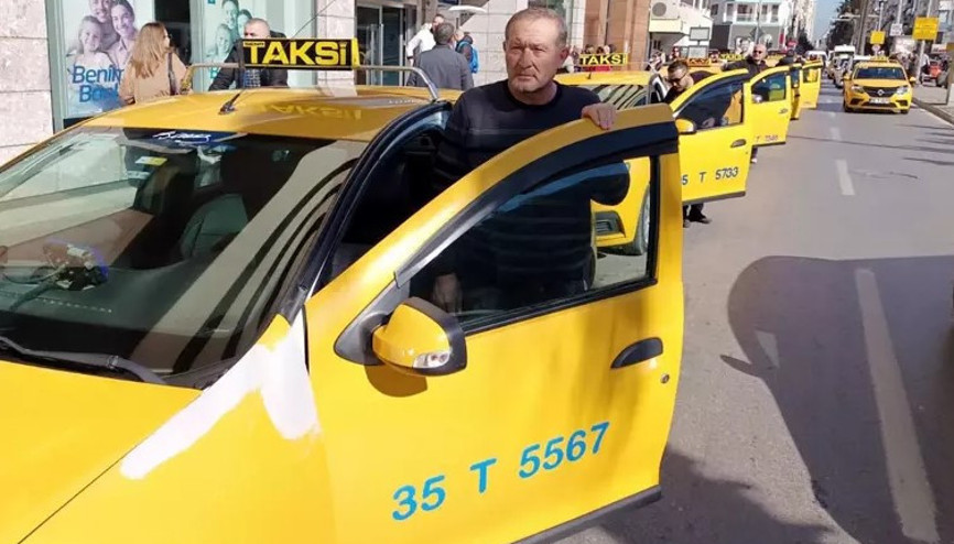 İzmirde aracına aldığı kişinin silahla öldürdüğü taksici Oğuz Ergenin meslektaşları yürüyüş yaptı