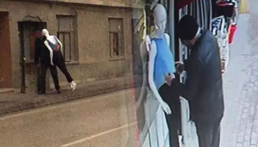 Cansız mankeni dakikalarca sevdi, kucaklayıp böyle götürdü