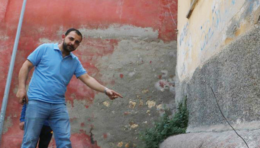 Ağır hasarlı binanın altında merak uyandıran eser: Depremden sonra dikkatleri üzerine çekti
