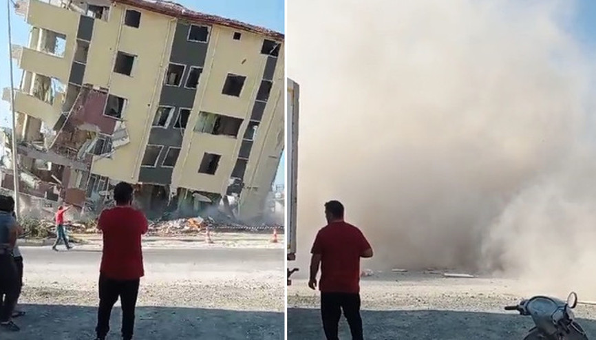 Hatayda panik anları: Ağır hasarlı bina, yıkım sırasında yola devrildi