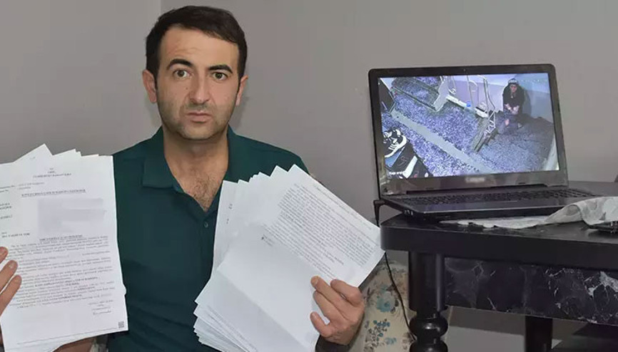 Komşusunun, kapısına çöp attığını taktırdığı kamerayla görüntüledi