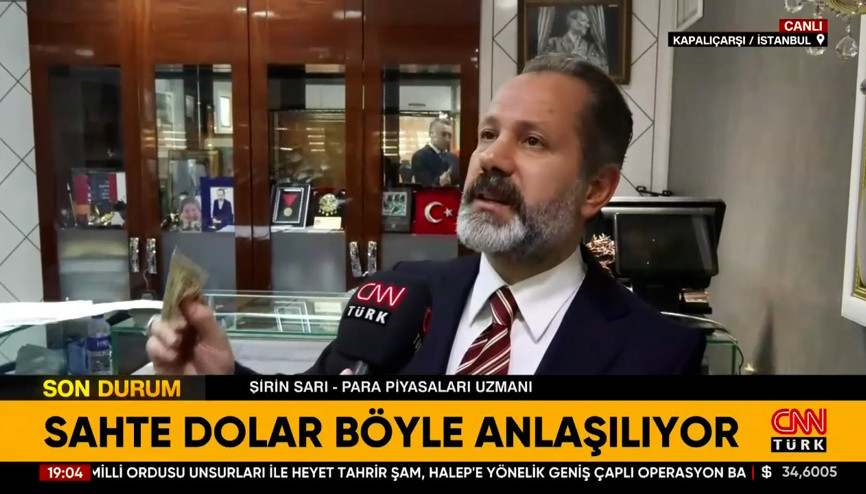 İslam Memiş CNN Türkte anlattı: Sahte dolar böyle anlaşılıyor İslam Memiş CNN Türkte anlattı: Sahte dolar böyle anlaşılıyor
