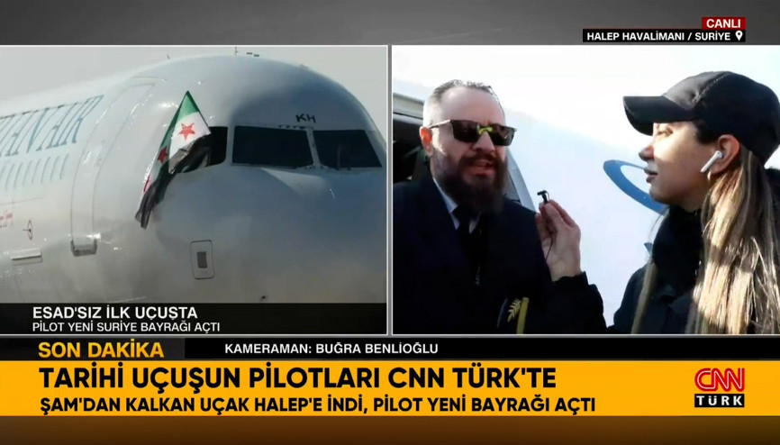 Şam Havalimanından kalkan ilk uçak Halepe indi, pilot yeni bayrağı açtı Şam Havalimanından kalkan ilk uçak Halepe indi, pilot yeni bayrağı açtı