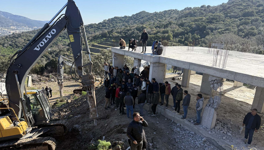 Bodrumda kaçak yapıların yıkımı sırasında gerginlik