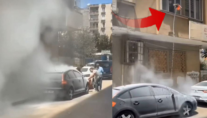 Yanan otomobilini bakın nasıl söndürmeye çalıştı Mardinde ilginç olay kamerada...