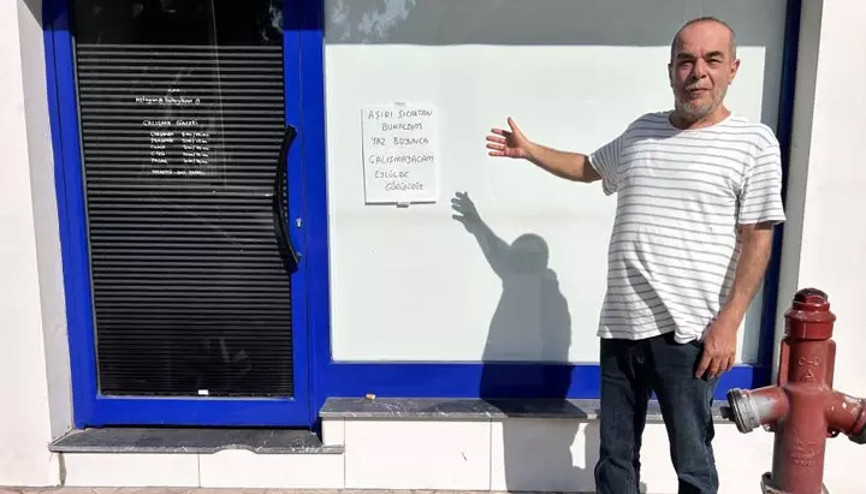 45 derecelik sıcağa dayanamayan esnaf tatile çıktı Eylülde görüşürüz