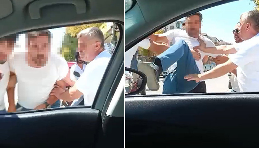 Dolmuş şoförü, tartıştığı sürücünün otomobilini tekmeledi