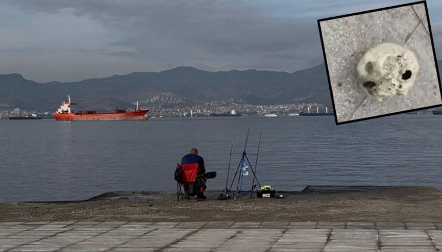 İzmir sahilinde tüyler ürperten olay, oltasına kafatası takıldı