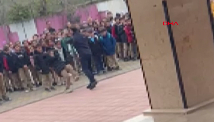 Okul müdürü öğrenciyi yakasından tutup yere savurdu