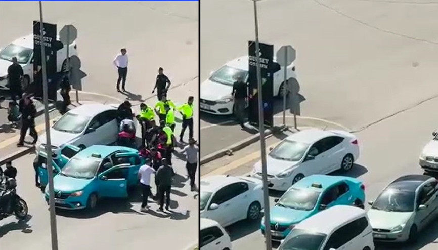 Kız arkadaşı ile taksi sürücüsünü rehin aldı Saldırganların yakalanma anı kamerada