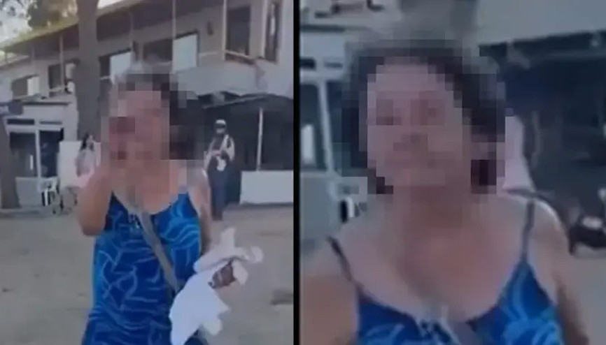 İzmirde anne ve kızına plajda hakaret ettiği öne sürülen kadın, yeniden gözaltına alındı
